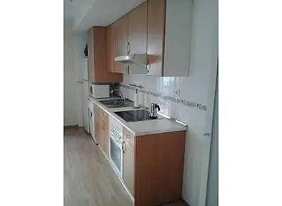 Una cocina o zona de cocina en Apartamento Mayor