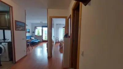 Una televisión o centro de entretenimiento en CHECK IN CASAS Pirita