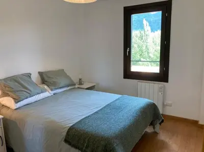 Cama o camas de una habitación en Casa rural con encanto en Hecho
