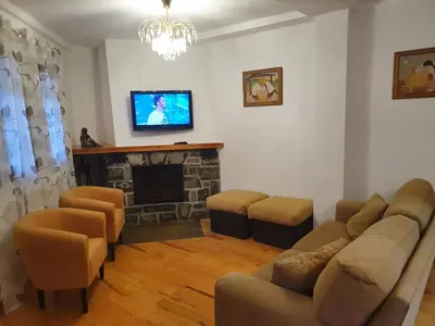 Una televisión o centro de entretenimiento en Apartamento Marboré