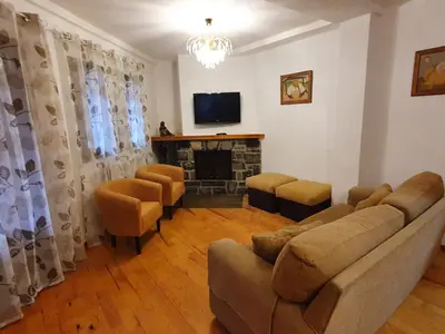Una televisión o centro de entretenimiento en Apartamento Marboré