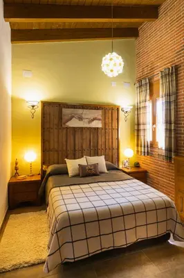 Cama o camas de una habitación en LA TEULERIA DE LINYOLA