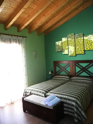 Cama o camas de una habitación en El Balsetón