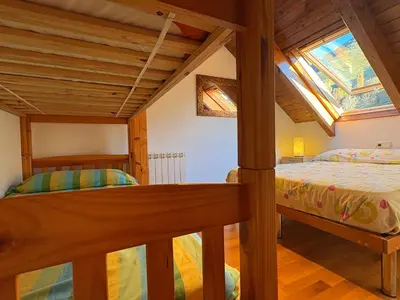 Cama o camas de una habitación en Cocina moderna, bajo cubierta rústico- Comodidad máxima - Erta 3