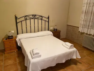 Cama o camas de una habitación en Casa Rural Can Salvado