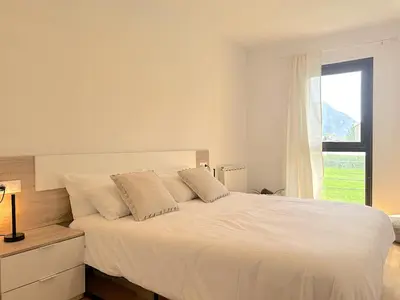Cama o camas de una habitación en Apartament de disseny rústic amb vistes by RURAL D'ÀNEU