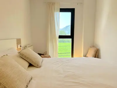 Cama o camas de una habitación en Apartament de disseny rústic amb vistes by RURAL D'ÀNEU