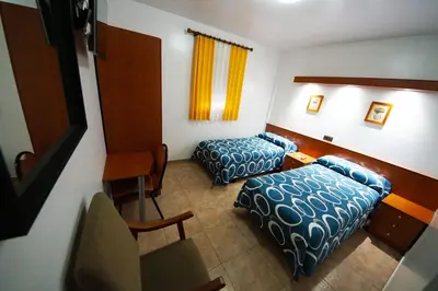 Cama o camas de una habitación en Hostal Restaurante El Surtidor