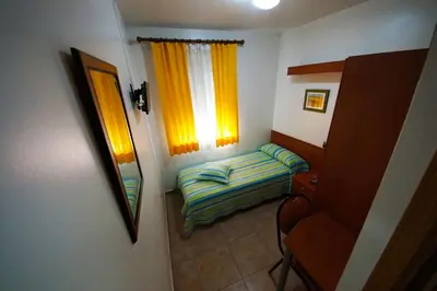 Cama o camas de una habitación en Hostal Restaurante El Surtidor