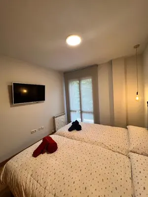 Cama o camas de una habitación en El Mirador De Cerler