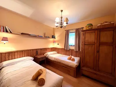 Cama o camas de una habitación en Apartament de la Vall Ferrera - L'Amfitriona