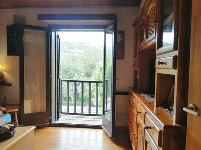 Una cocina o zona de cocina en Ambiente cálido y acogedor -Rincón rústico - Falcó 17
