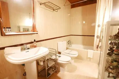 Un baño de Casa Estela - Duplex by Cardi Suites
