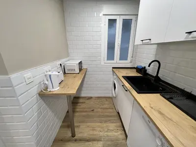 Una cocina o zona de cocina en Apartamenticos Plaza Las Armas III
