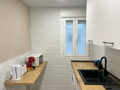 Una cocina o zona de cocina en Apartamenticos Plaza Las Armas III