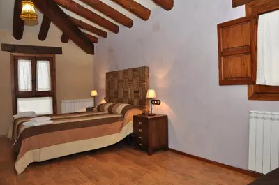 Cama o camas de una habitación en Apartamentos Turismo Rural Casa Purroy