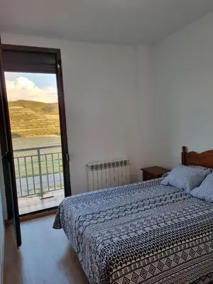 Cama o camas de una habitación en Albergue Valmadrid