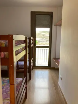 Cama o camas de una habitación en Albergue Valmadrid