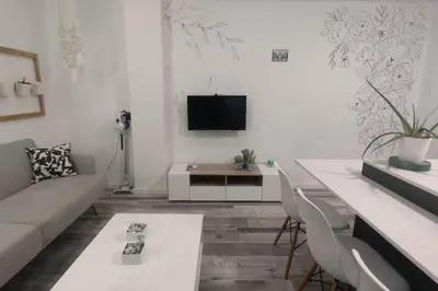 Una televisión o centro de entretenimiento en Apartamento Turquesa