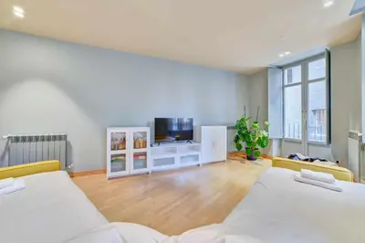 Cama o camas de una habitación en Apartamento El Rincón del Chupinazo
