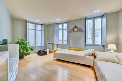 Cama o camas de una habitación en Apartamento El Rincón del Chupinazo
