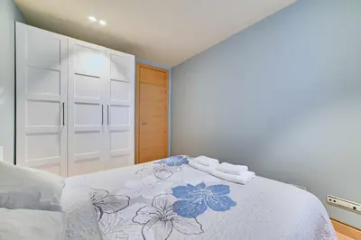 Cama o camas de una habitación en Apartamento El Rincón del Chupinazo