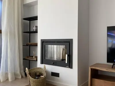 Una televisión o centro de entretenimiento en Apartamento ideal en el corazón de los Pirineos