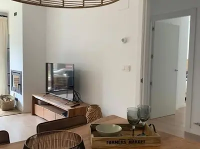 Una televisión o centro de entretenimiento en Apartamento ideal en el corazón de los Pirineos