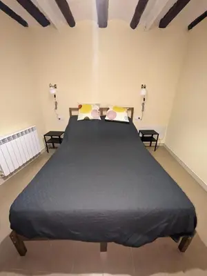 Cama o camas de una habitación en Apartamentos Rurales CR Mazaleón
