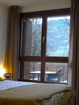 Cama o camas de una habitación en Apartamento Milla de Oro Benasque