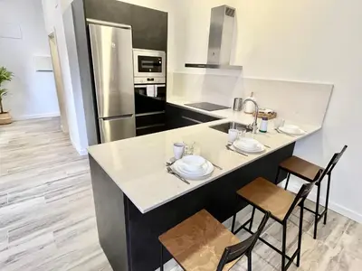 Una cocina o zona de cocina en Apartamento Vive Zaragoza V
