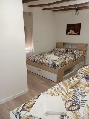 Cama o camas de una habitación en Apartamentos 