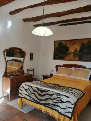 Cama o camas de una habitación en CAL BENAIGES