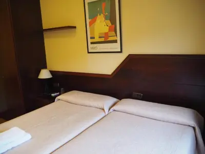 Cama o camas de una habitación en Alojamientos Acella