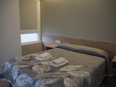 Cama o camas de una habitación en Alojamientos Acella