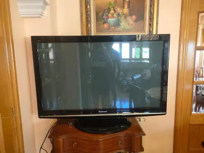 Una televisión o centro de entretenimiento en LA RIOJA HOUSE casa entera Mesa de pinpong Parking gratuito, Chimenea, barbacoa CENTRO
