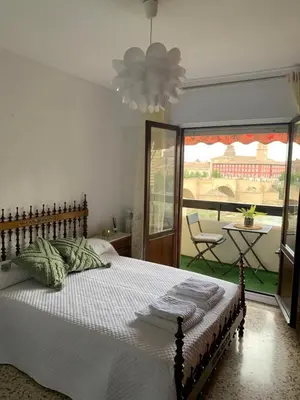 Cama o camas de una habitación en Apartamento Con Vistas Al Pilar con Aparcamiento privado