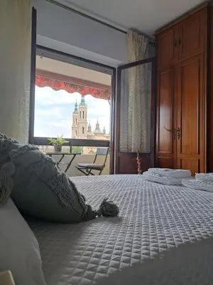 Cama o camas de una habitación en Apartamento Con Vistas Al Pilar con Aparcamiento privado