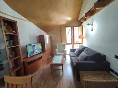 Una televisión o centro de entretenimiento en Inmocyma Soldorau-Benasque