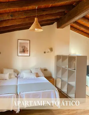 Cama o camas de una habitación en Alojamientos Apolonia, La Fresneda