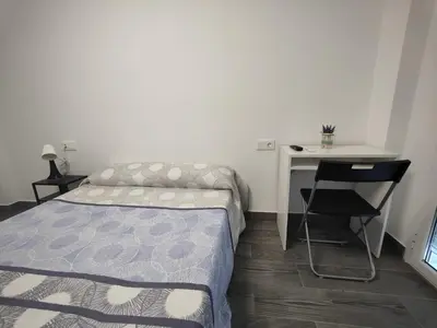 Cama o camas de una habitación en PENSION IRATI