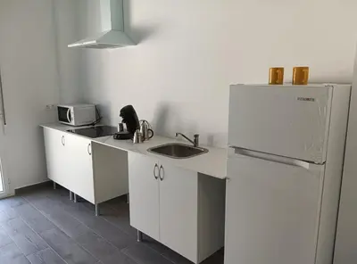 Una cocina o zona de cocina en PENSION IRATI