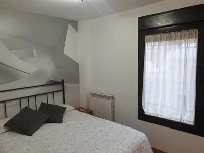 Cama o camas de una habitación en Centro aparcamiento gratuito al lado del pilar