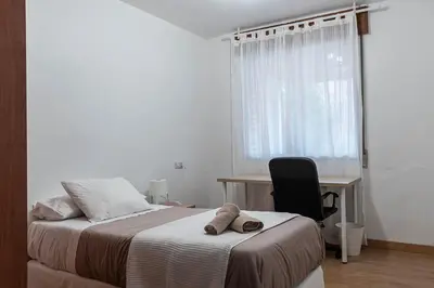 Cama o camas de una habitación en Funcional y renovado apartamento en Iturrama