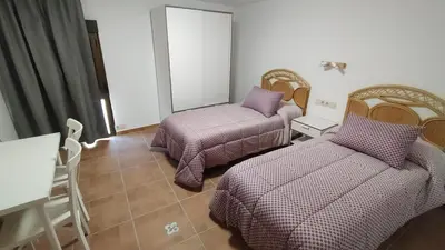 Cama o camas de una habitación en Casa Marcelinas por habitaciones