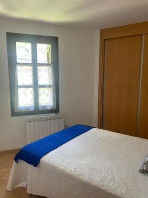 Cama o camas de una habitación en Rincón Pirenaico