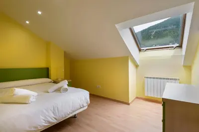 Cama o camas de una habitación en Atico la Espata Villanua