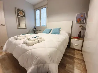 Cama o camas de una habitación en Apartamentos Dos Torres Meriadoc