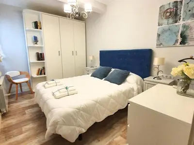 Cama o camas de una habitación en Apartamentos Dos Torres Meriadoc