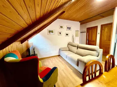 Zona de estar de Apartamento La Buhardilla del Boscache